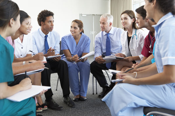 Healthcare workers having a discussion